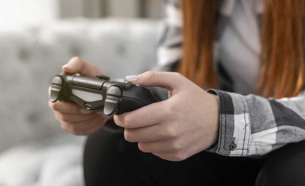 female-playing-video-games-close-up